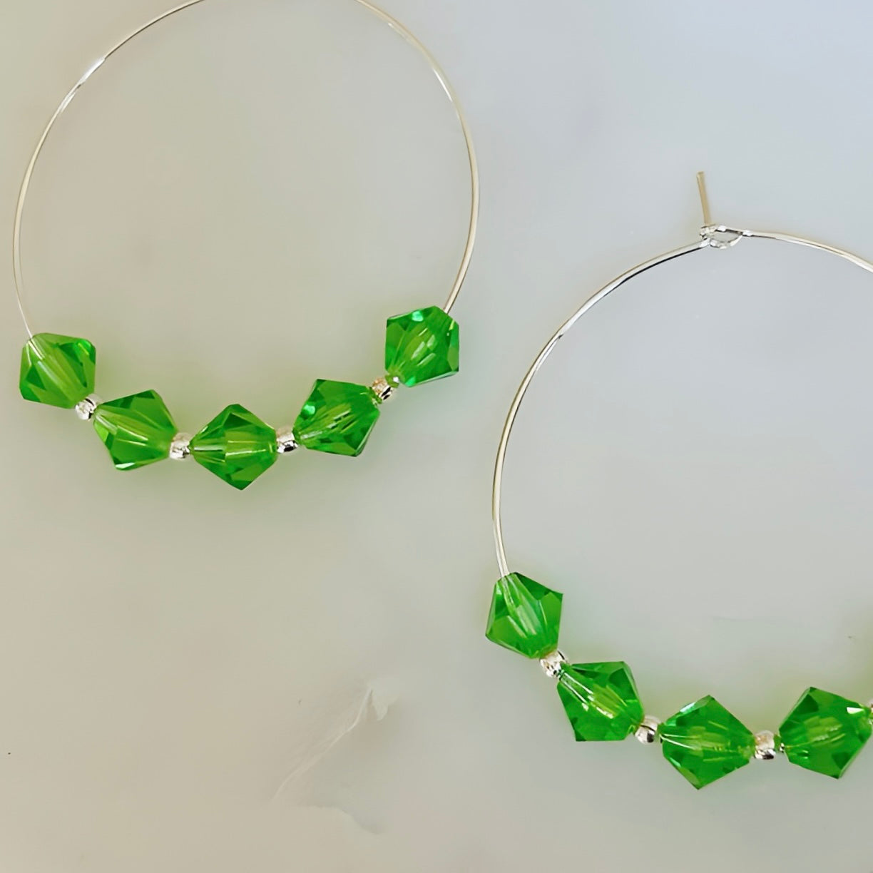 A Pair of Green Crystal Lightweight Silver Boho Hoop Earrings