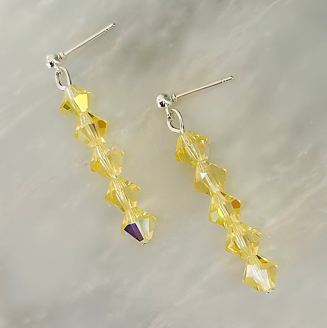Sparkling Yellow Crystal Dangle Earrings With Silver Finish