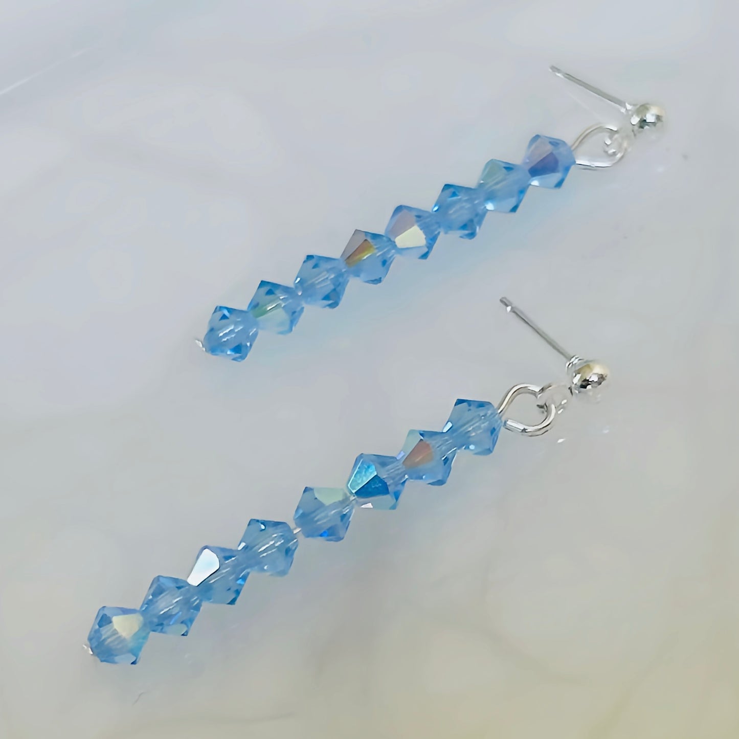 Dainty Blue Dangle Drop Earrings With Silver Statement Design