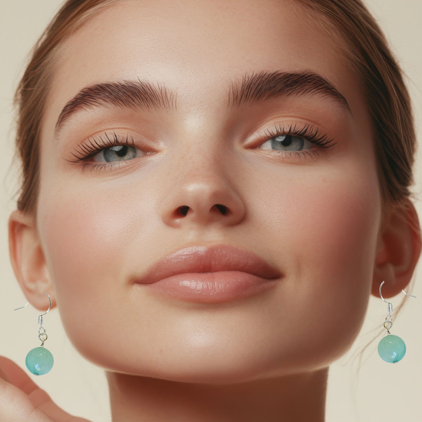 Adorned Natural Stone Dangle Ball Earrings With Silver Finish