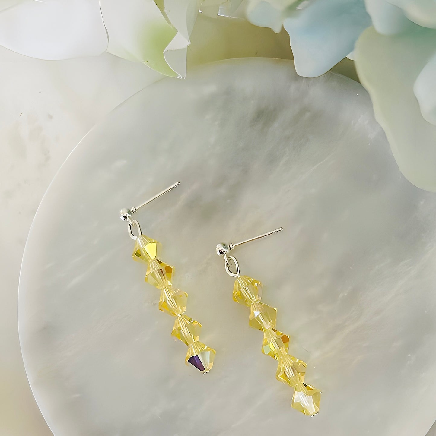 Sparkling Yellow Crystal Dangle Earrings With Silver Finish