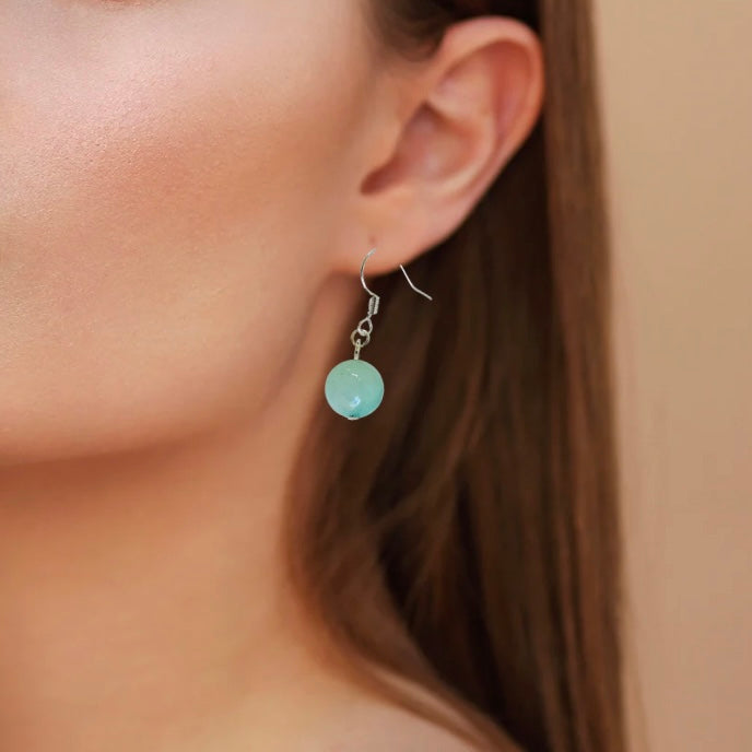 Adorned Natural Stone Dangle Ball Earrings With Silver Finish