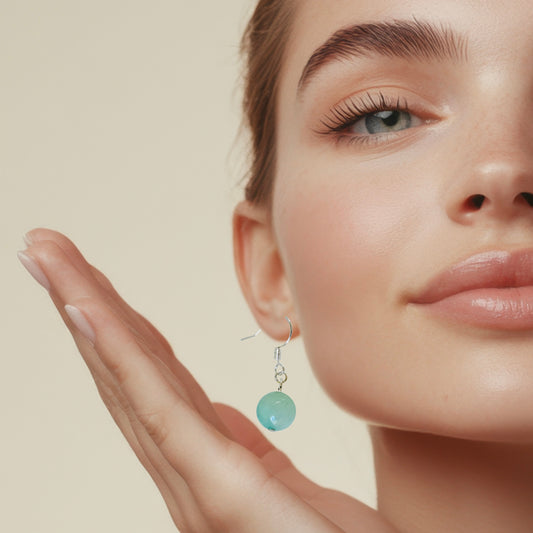 Adorned Natural Stone Dangle Ball Earrings With Silver Finish